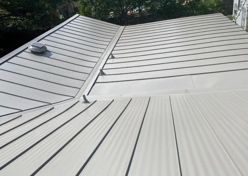 Solar attic fan installed on a metal roof for Roof Ventilation in Pleasanton